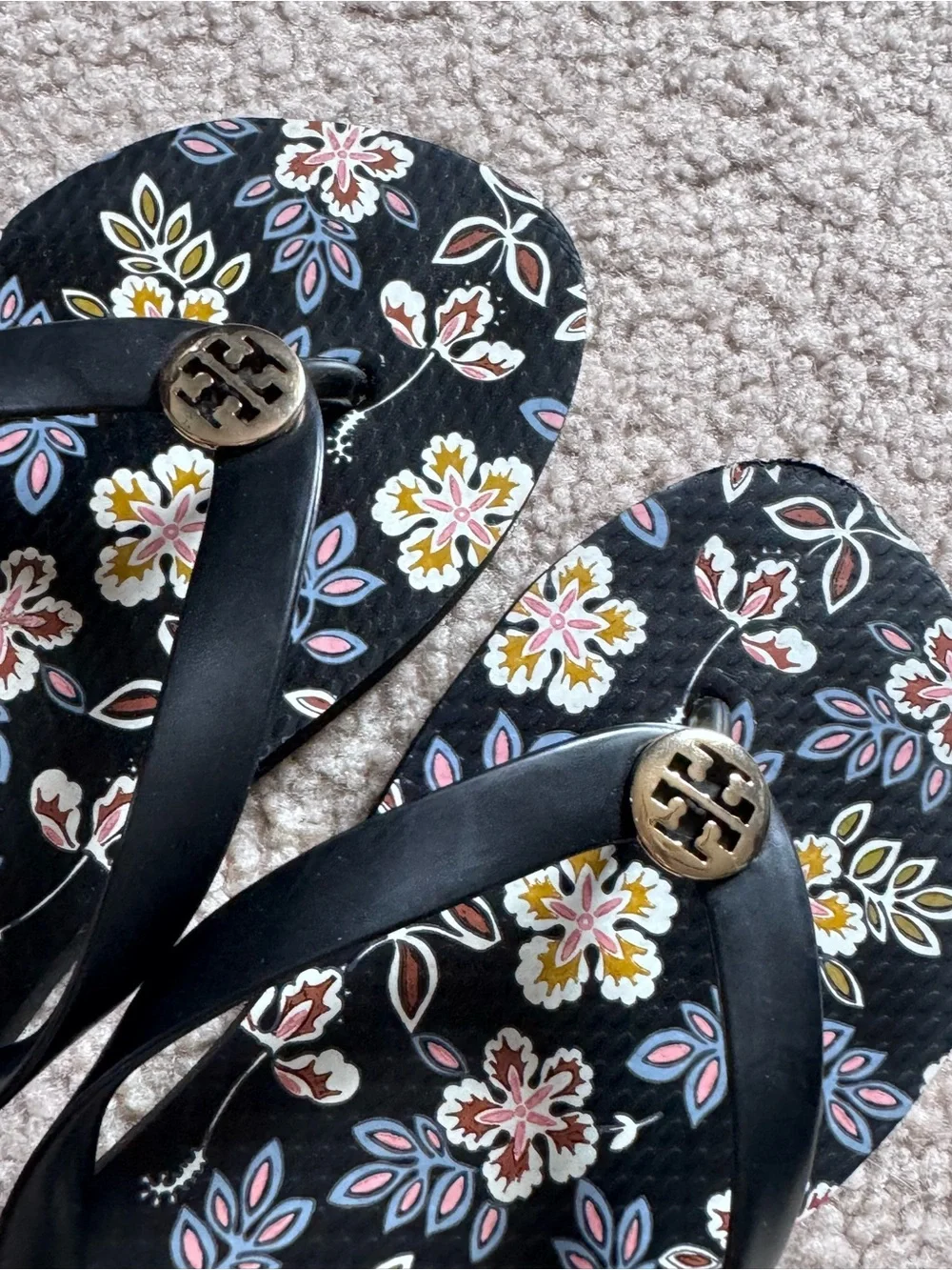 Tory Burch Black Floral Flip Flop Sandals with Gold Emblem
